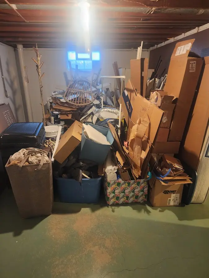 Roll-off dumpster container at job site for 2 Yard Dumpster Rental in Sheffield Lake